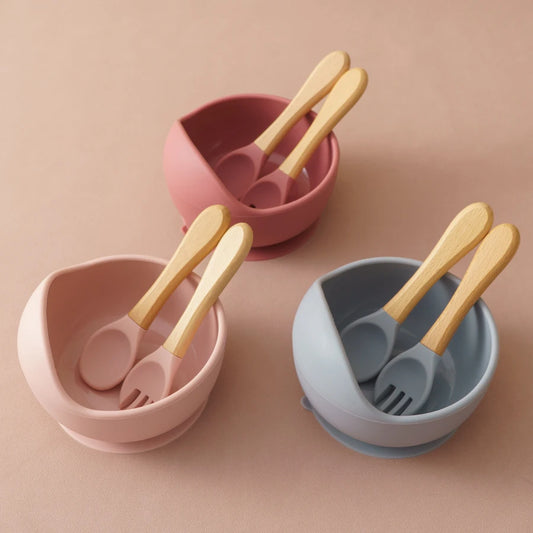 NourishNest™ 3‑Piece Silicone Feeding Set — Suction Bowl, Wood Spoon & Fork for Baby Learning