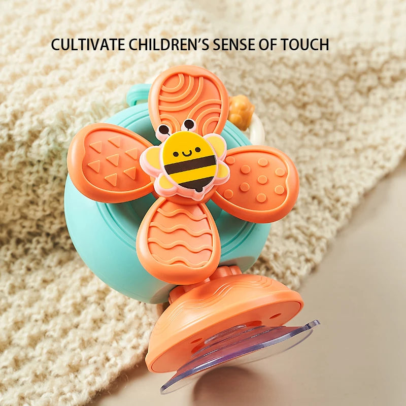Wild Child™ Suction Snail Sensory Spinner Toy